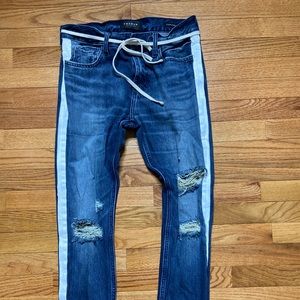 Stacked ripped skinny jeans